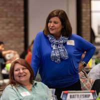 PSSDC chair standing and talking